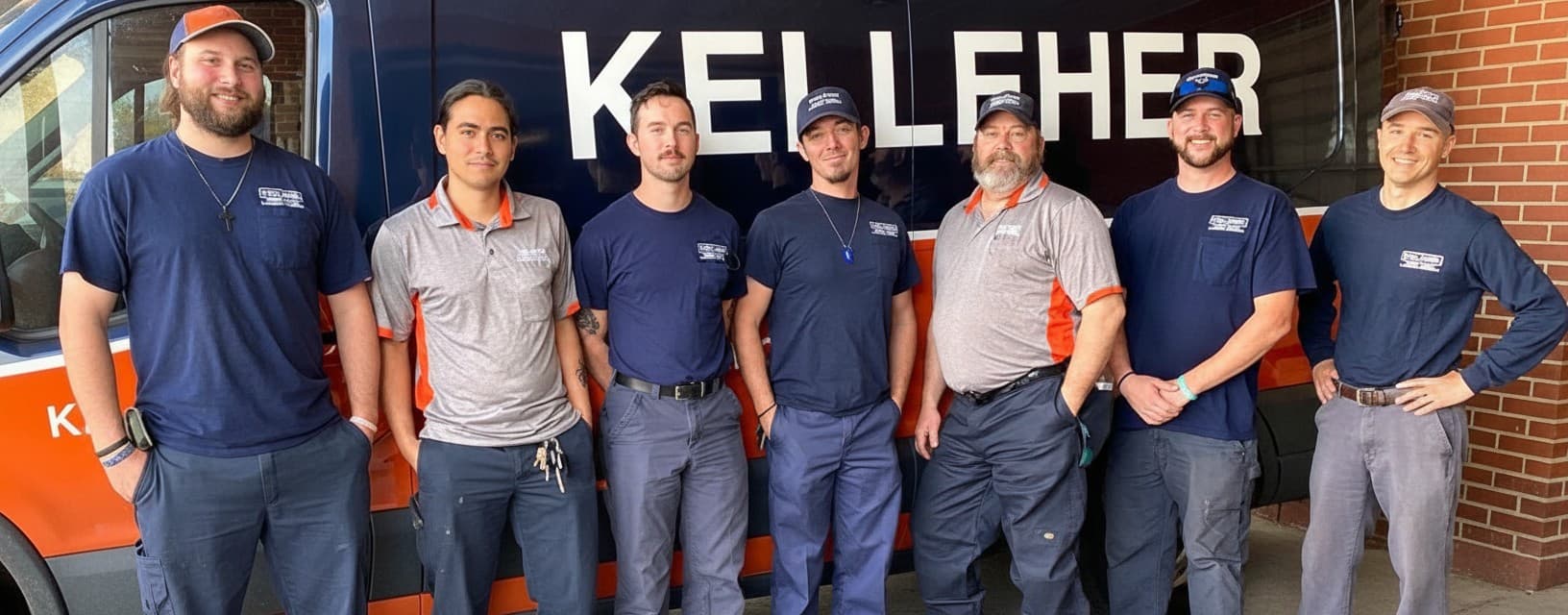 Kelleher plumbing team with their service van