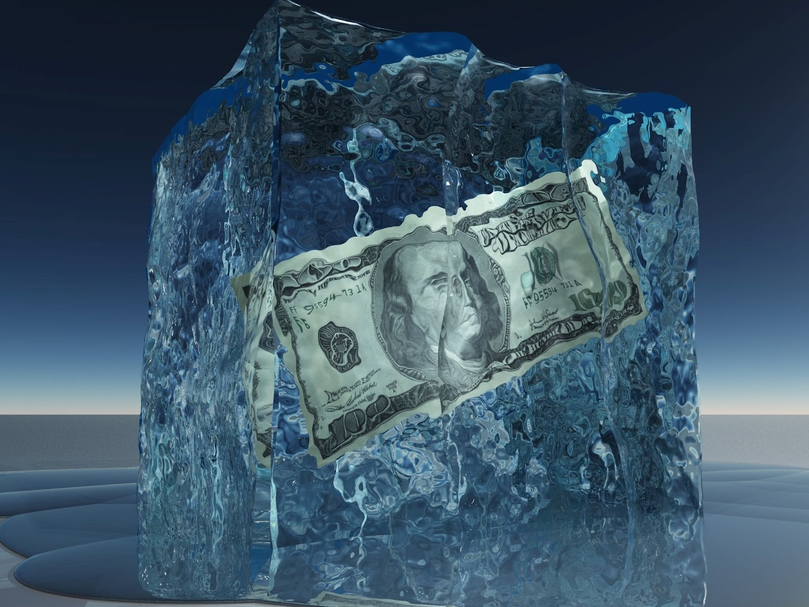 One hundred dollar bill inside a block of ice
