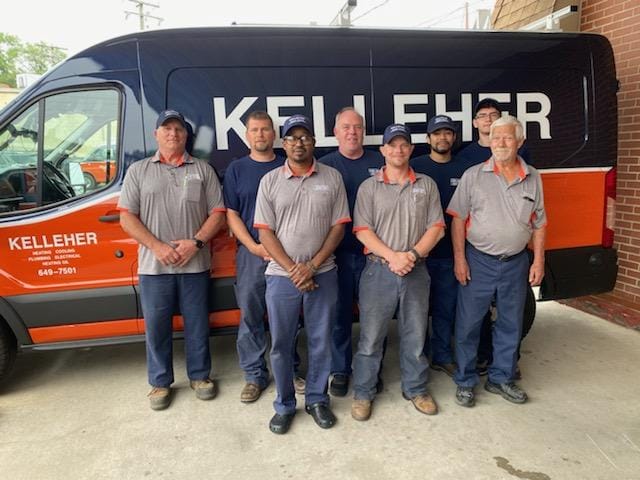 HVAC team at Kelleher standing in front of a Kelleher van