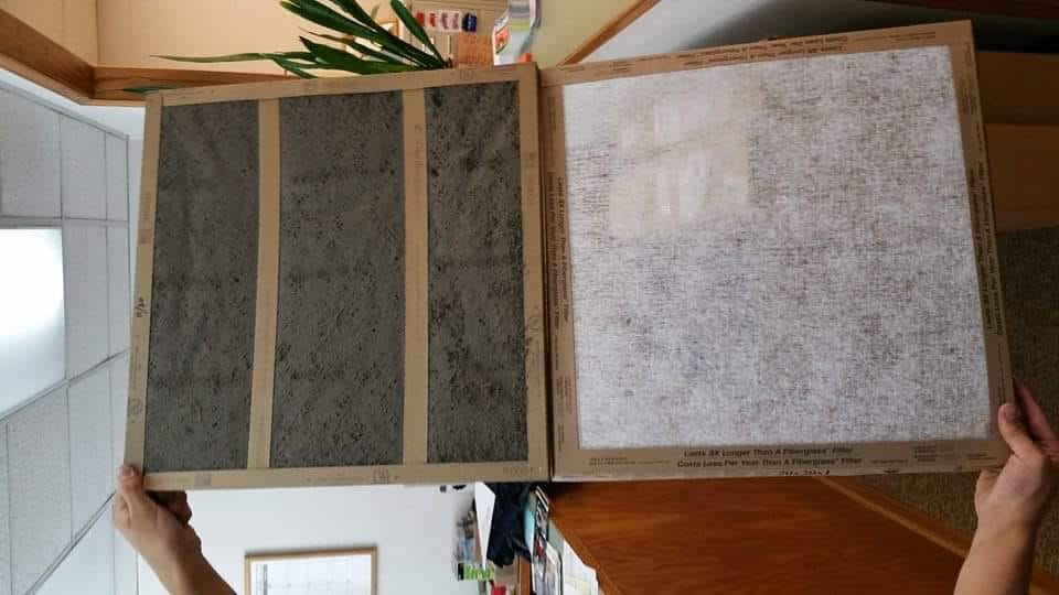 Side by side of a clean air filter next to a dirty air filter
