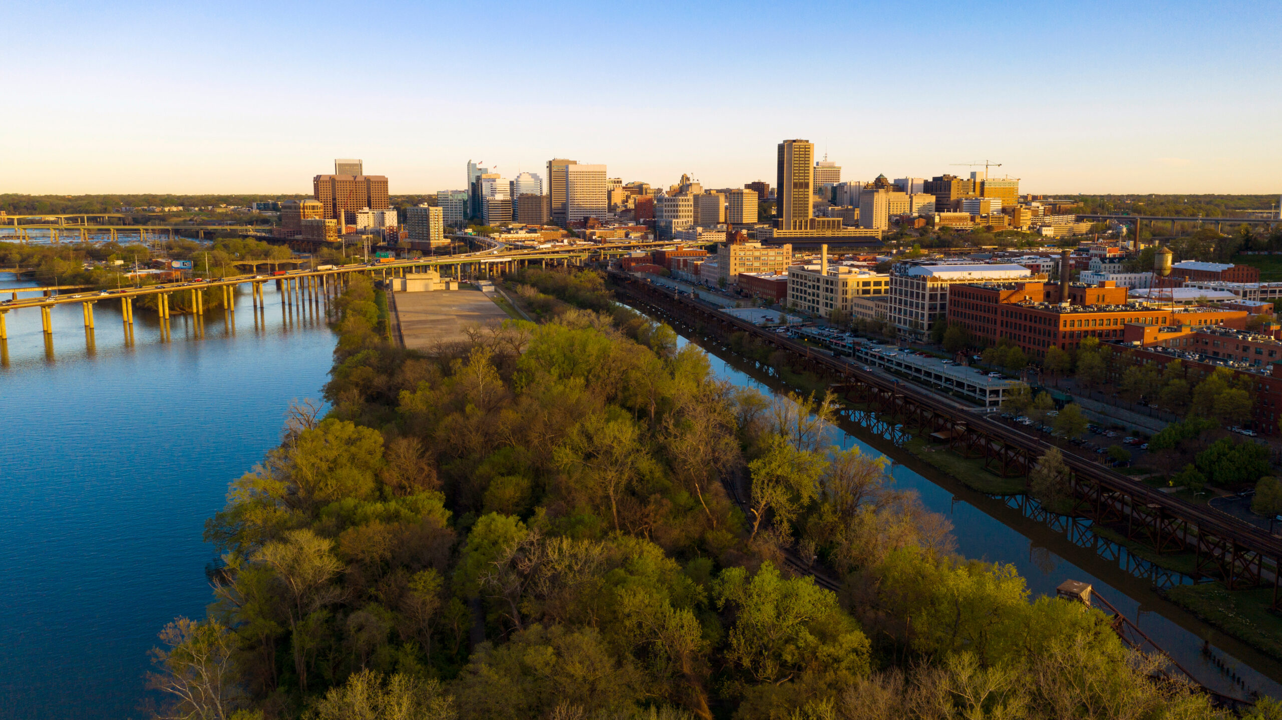 Sunrise over the downtown Richmond, VA skyline and the James River